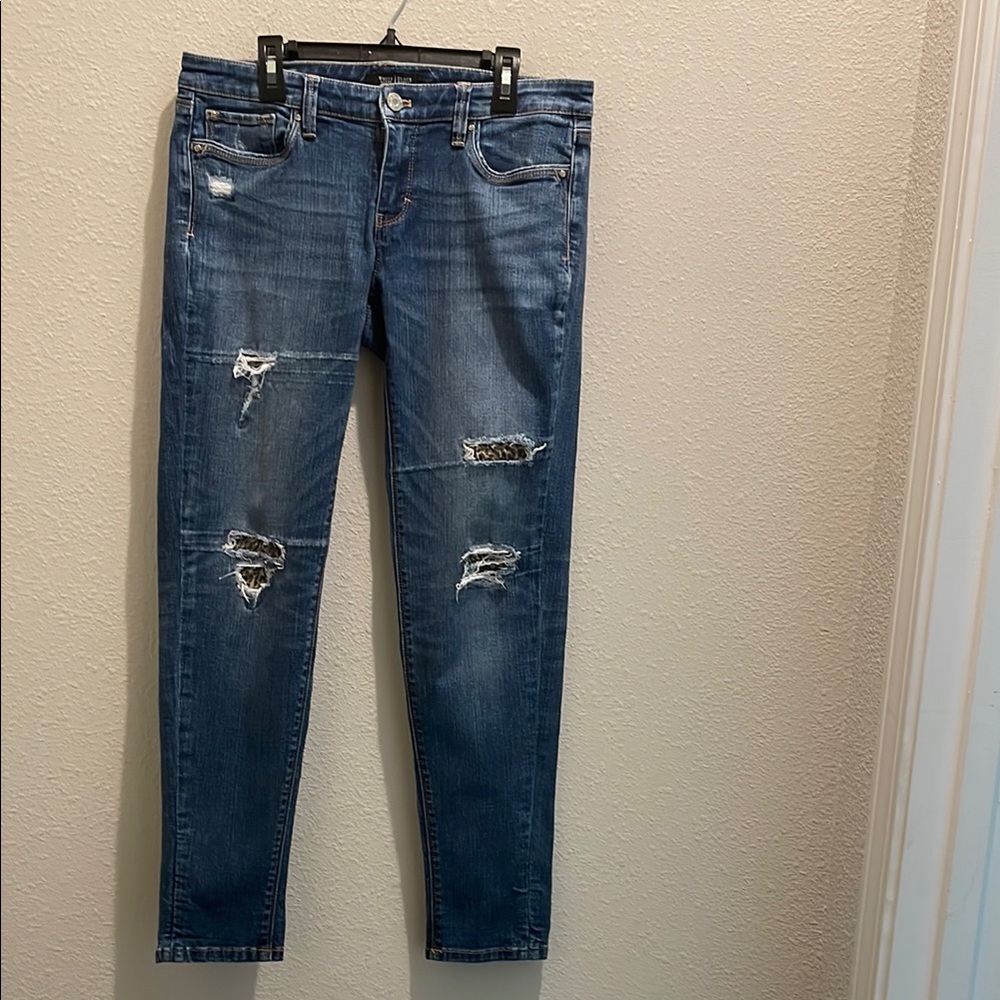 White House Black Market Blue Skinny Jeans with Modern Distressing